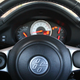Steering wheel, complete with a big block-off plate on the right.